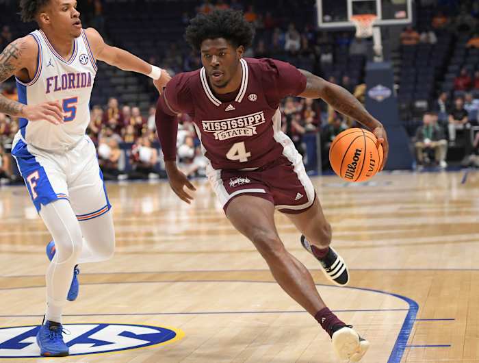 Mississippi State Bulldogs guard Cameron Matthews dribbles the ball.